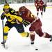Michigan freshman right wingman Andrew Copp attempts to get by Ferris State junior defenseman Scott Czarnowczan on Friday, Mar. 1. Daniel Brenner I AnnArbor.com